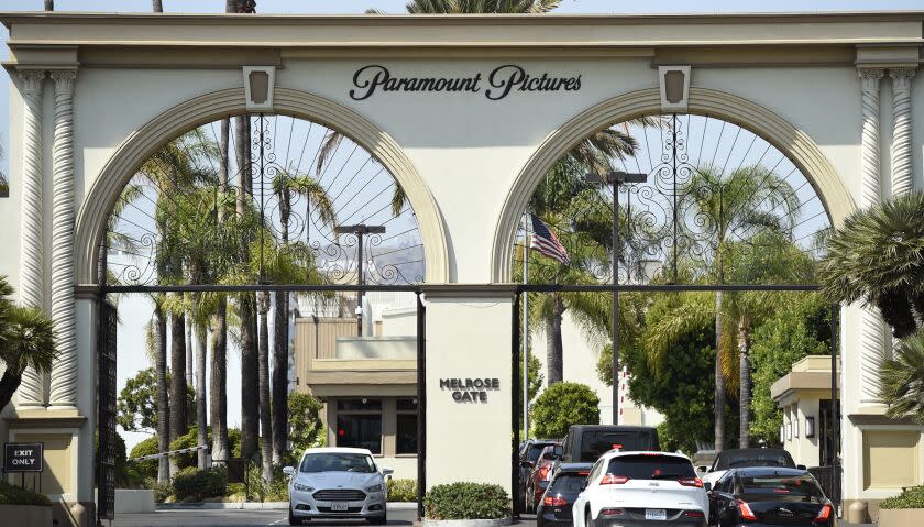 FILE - The Paramount Pictures gate is pictured on Aug. 23, 2016, in Los Angeles. The studio is joining other major Hollywood studios in slashing the traditional 90-day theatrical window. ViacomCBS on Wednesday, Feb. 24, 2021, announced that the studio's films, including "Mission: Impossible 7" and "A Quiet Place Part II," will go to its fledgling streaming service, Paramount+, after 45 days in theaters. (Photo by Chris Pizzello/Invision/AP, File)
