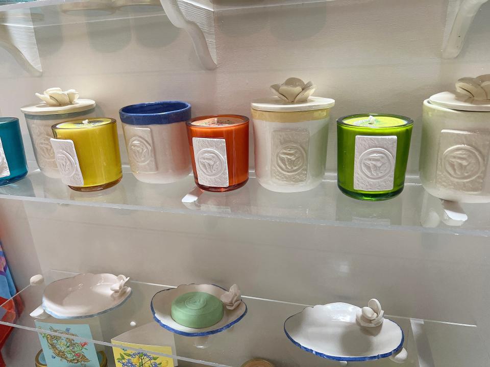 Candles and ceramics by PopJoy Studios are pictured in their showroom inside The Station by the Tracks in Gadsden.