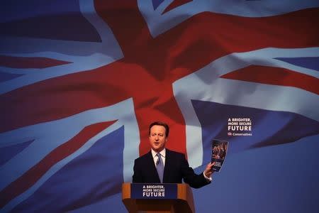 Britain's Prime Minister David Cameron presents the Conservative party election manifesto in Swindon, April 14, 2015. REUTERS/Peter Macdiarmid/Pool