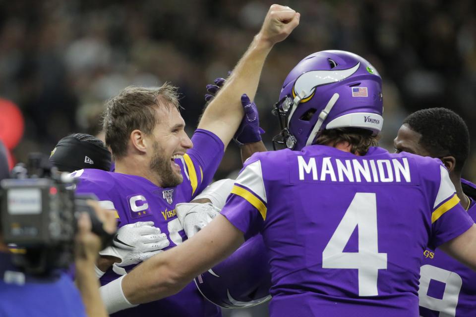 Kirk Cousins celebrates after defeating the Saints in a 2019 NFC wild-card playoff game.