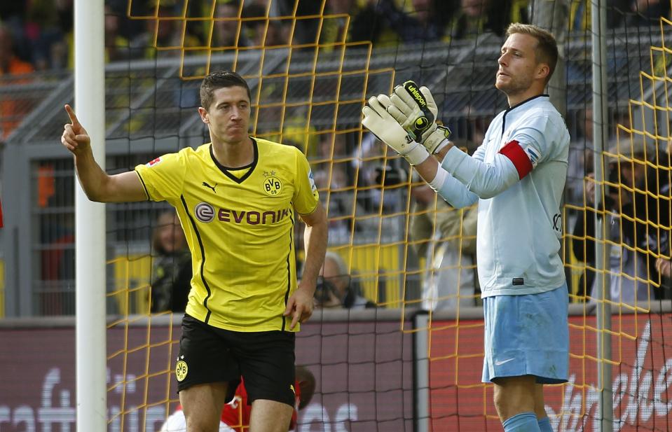 Borussia Dortmund's Lewandowski celebrates a goal against Freiburg during the German first division Bundesliga soccer match in Dortmund