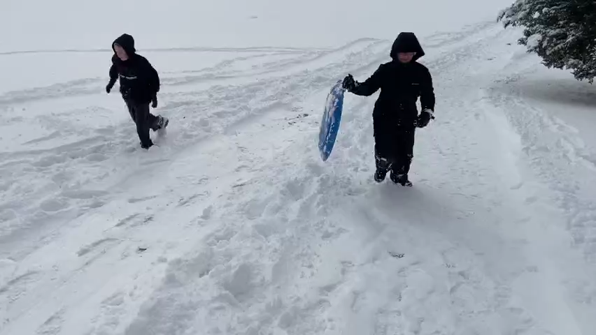 Snow sledding at Norwich Golf Course