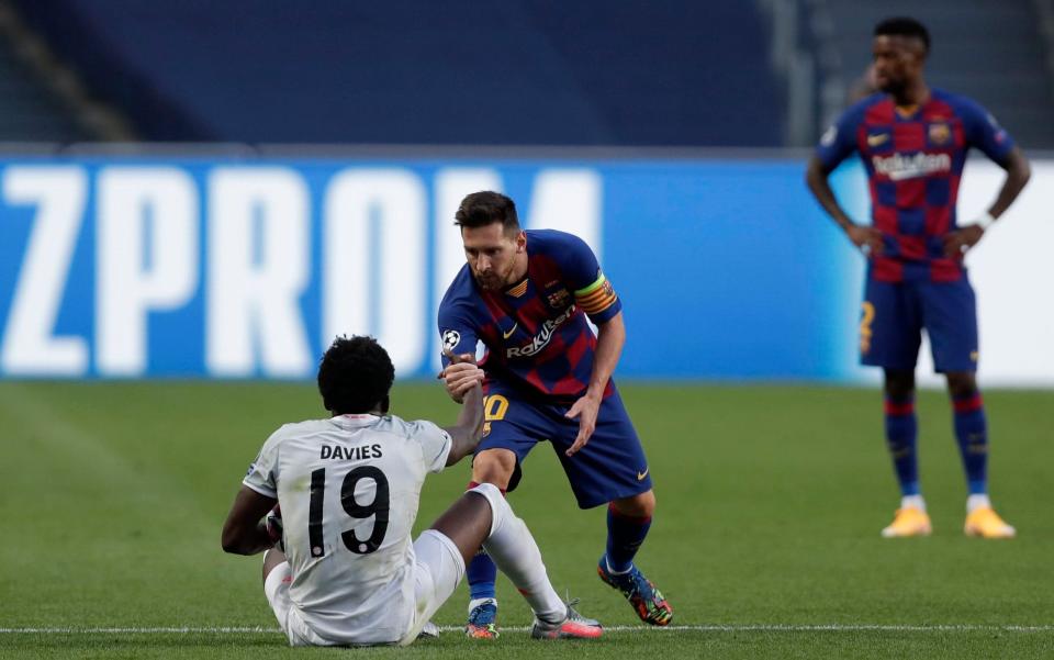 Nelson Semedo in the background after Barcelona's Champions League humiliation against Bayern Munich - Getty Images