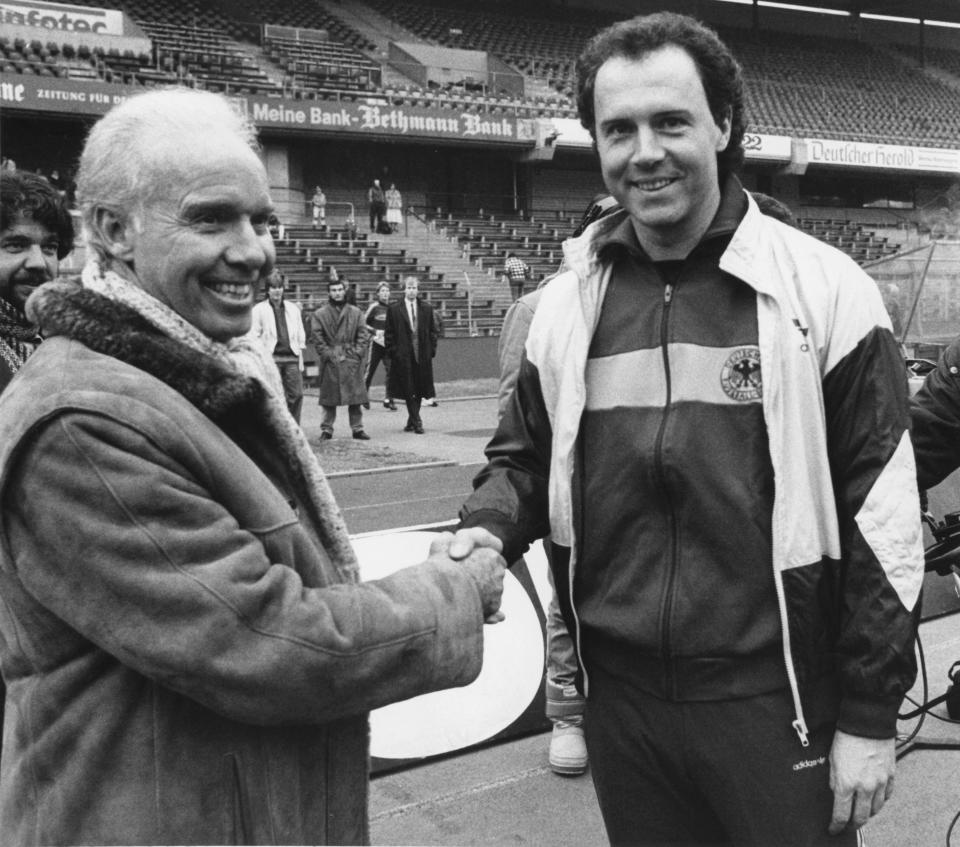 Mário Zagallo and Franz Beckenbauer shake hands ahead of a Brazil-Germany match in 1986. (Eilmes/Picture Alliance via Getty Images)