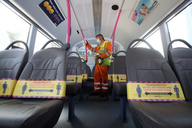 Cleaner James York from First Bus cleans a bus at the firm's Larbert depot ahead of the bus returning to service. Due to social distancing measures only a certain number of people will be able to travel on a particular bus after the introduction of measures to bring the country out of lockdown.