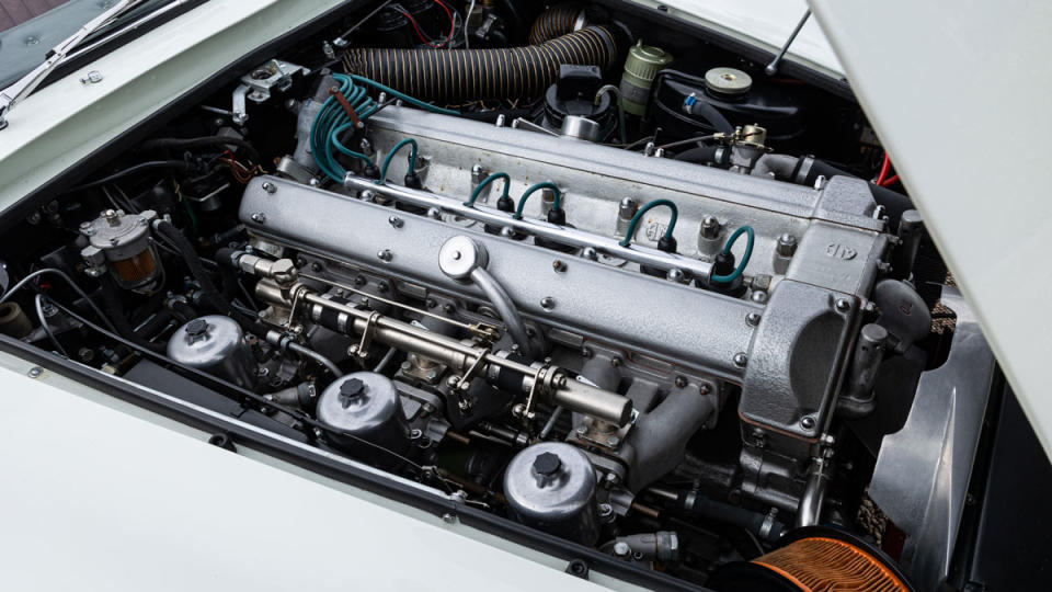 The 282 hp, 4.0-liter six-cylinder engine inside a 1965 Aston Martin DB5 Convertible.