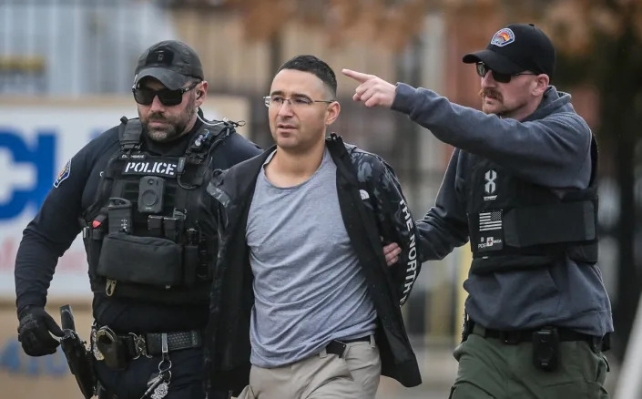 Solomon Peña being arrested on Monday by a APD SWAT team (AP)