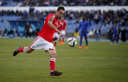 Benfica's Jonas Oliveira shoots to score his second goal against Belenenses during their Portuguese Premier League soccer match at Restelo stadium in Lisbon April 18, 2015. REUTERS/Rafael Marchante