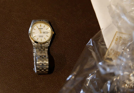 A watch that Yasuhiro Sato wore until his death is placed on a table after he died of lung cancer at his house in Tokyo, Japan, September 13, 2017. REUTERS/Toru Hanai