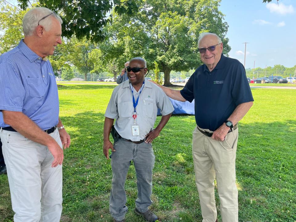 (Left) Attendee Ron Pope, James Carouthers hospital lead grounds keeper and past longest-serving Maury Regional Medical Center CEO Bill Walters greet each other at the hospital expansion unveiling ceremony on the medical center lawn in Columbia, Tenn. on Friday, June 30, 2023.