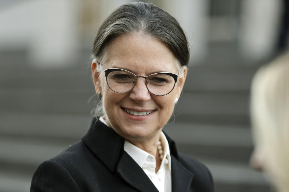 Attorney Jayne Conroy speaks to the media outside the U.S. Federal courthouse, Monday, Oct. 21, 2019, in Cleveland. The nation's three dominant drug distributors and a big drugmaker have reached a $260 million deal to settle a lawsuit related to the opioid crisis just as the first federal trial over the crisis was due to begin Monday. (AP Photo/Tony Dejak)