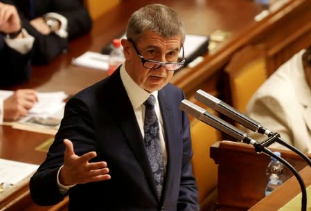 FILE PHOTO: Czech Prime Minister Andrej Babis attends a parliamentary session during a no-confidence vote for the government he leads, in Prague