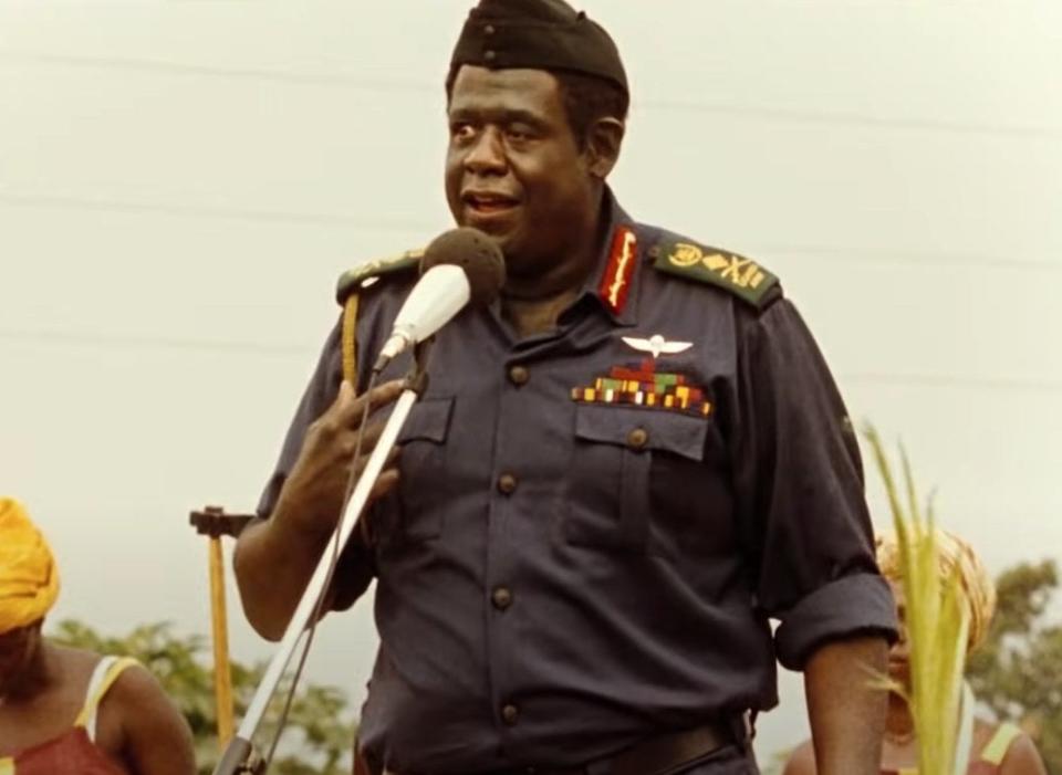 Forest Whitaker as Idi Amin speaks in front of a crowd