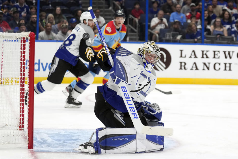 Tampa Bay Lightning goaltender Andrei Vasilevskiy (88) makes a save on a shot by the Florida Panthers during the first period of an NHL hockey game Saturday, Dec. 10, 2022, in Tampa, Fla. (AP Photo/Chris O'Meara)