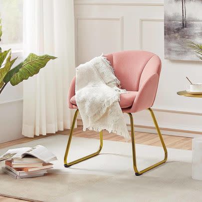 A flower petal-shaped velvet chair for up to 57% off