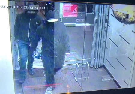 A still from CCTV footage shows the suspects of the explosion at Bombay Bhel restaurant in Mississauga, Ontario, Canada May 24, 2018 in this picture obtained from social media on May 25, 2018.