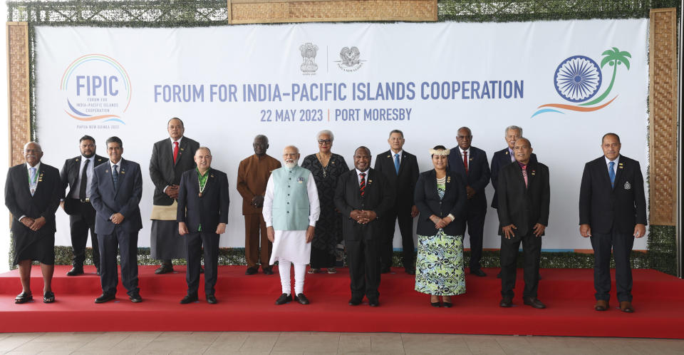 In this photo released by India's Press Information Bureau, Indian Prime Minister Narendra Modi, fourth left, front row, poses with leaders of the Forum for India-Pacific Islands Cooperation (FIPIC) in Port Moresby, Papua New Guinea, Monday, May 22, 2023. Modi is meeting with Pacific leaders to discuss better cooperation. (Press Information Bureau via AP)