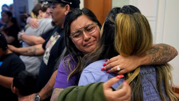 PHOTO: Family members of the victims of the Uvalde shootings react after a Texas House committee voted to take up a bill to limit the age for purchasing AR-15 style weapons in the full House in Austin, Texas, May 8, 2023. (Eric Gay/AP)