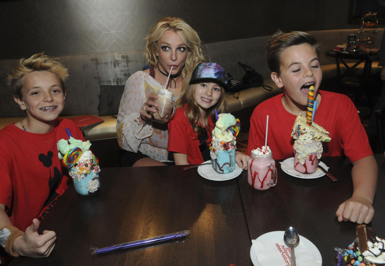 ORLANDO, FL - MARCH 13:   (EDITORS NOTE: Image has been retouched.) Britney Spears enjoys a family outing  with Jayden Federline, Maddie Aldridge and Sean Federline at Planet Hollywood Disney Springs on March 13, 2017 in Orlando, Florida. (Photo by Gerardo Mora/Getty Images for Planet Hollywood Observatory)