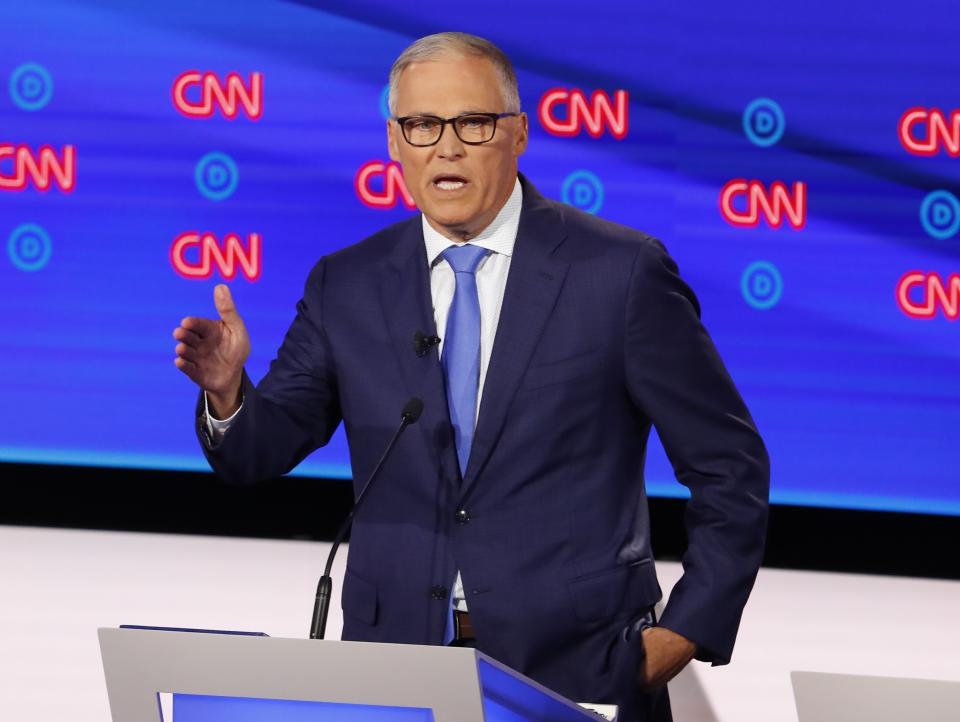 FILE - In this July 31, 2019 file photo, Washington Gov. Jay Inslee speaks during the second of two Democratic presidential primary debates hosted by CNN in the Fox Theatre in Detroit. Inslee, who made fighting climate change the central theme of his presidential campaign, announced Wednesday night, Aug. 21, 2019, that he is ending his bid for the 2020 Democratic nomination. Inslee announced his decision on MSNBC, saying it's become clear that he won't win. (AP Photo/Paul Sancya, File)