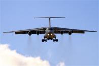 A Chinese Ilyushin IL-76 aircraft lands at Perth International Airport, after participating in the continuing search in the southern Indian Ocean for the missing Malaysian Airlines flight MH370, April 16, 2014. REUTERS/Richard Wainwright/Pool