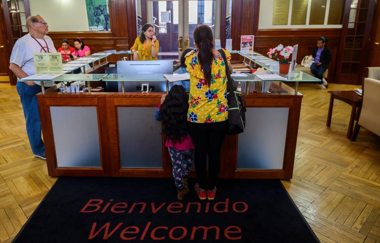 <span class="caption">A woman and her child seek help from CASA, an immigrants rights group, in Maryland in 2019.</span> <span class="attribution"><a class="link " href="https://www.gettyimages.com/detail/news-photo/woman-and-her-daughter-arrive-at-the-office-of-the-news-photo/1170066991" rel="nofollow noopener" target="_blank" data-ylk="slk:Andrew Caballero-Reynolds/AFP via Getty Images;elm:context_link;itc:0;sec:content-canvas">Andrew Caballero-Reynolds/AFP via Getty Images</a></span>