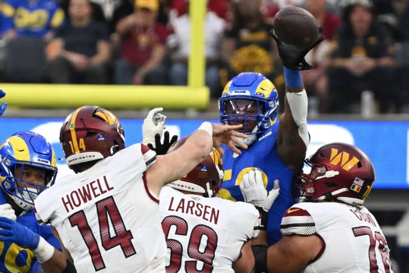 Washington Commanders center Tyler Larsen blocks for quarterback Sam Howell while facing the Los Angeles Rams on Sunday at SoFi Stadium in Inglewood, Calif. Photo by Jon SooHoo/UPI