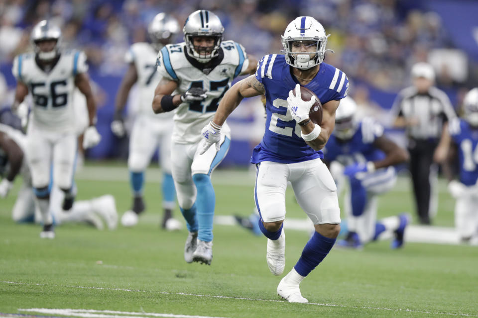 Indianapolis Colts' Jordan Wilkins (20) runs during the second half of an NFL football game against the Carolina Panthers, Sunday, Dec. 22, 2019, in Indianapolis. (AP Photo/Michael Conroy)