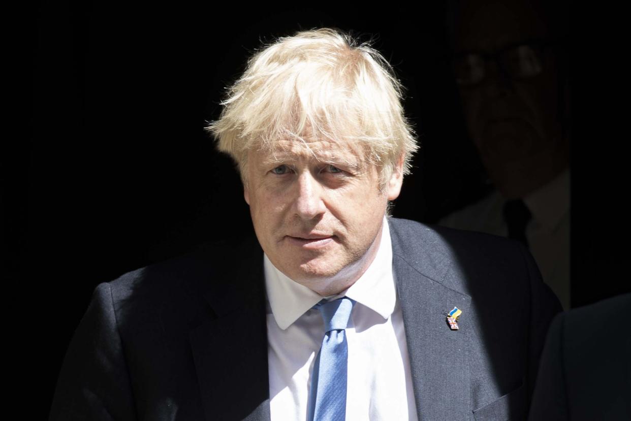 LONDON, UNITED KINGDOM - JULY 20: British Prime Minister Boris Johnson leaves 10 Downing Street for his weekly Prime Minister's Questions (PMQs) appearance in the House of Commons in London, United Kingdom on July 20, 2022. (Photo by Rasid Necati Aslim/Anadolu Agency via Getty Images)