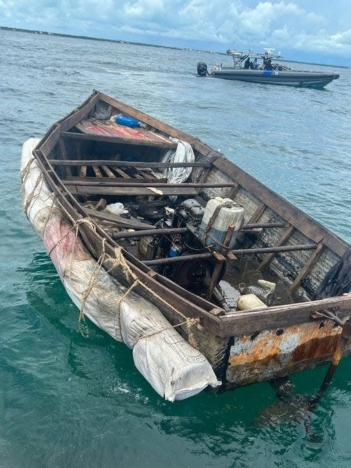 A makeshift boat confiscated by the U.S. Coast Guard that was carrying Cuban migrants. The Coast Guard usually spray paints "CG OK" on the side of the boats -- to signal the passengers aboard were rescued -- and sets them adrift in the current. They often wash up on Florida beaches.