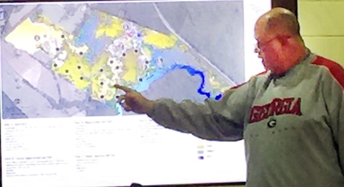 Jerry Coalson, Jefferson County Administrator, discusses a map of Ogeechee Crossing Park with commissioners at their January meeting.