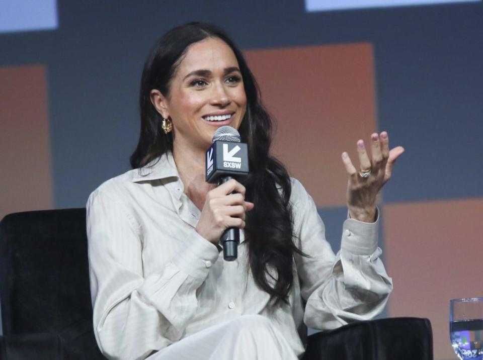 Meghan Markle’s decision to stay home during Prince Harry’s trip to London has been slammed as “odd.” Jack Plunkett/Invision/AP