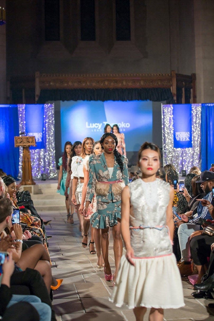 Models walk the runway in the Michigan Fashion Week show in March 2020.