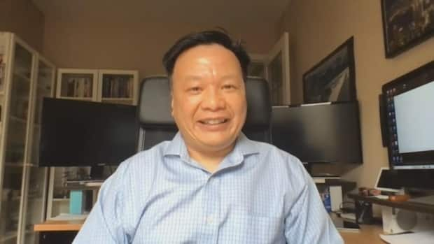 Billy Lo is one of the volunteers who created a vaccine verification tool that allows users to convert their vaccination receipt into a QR code. (CBC - image credit)