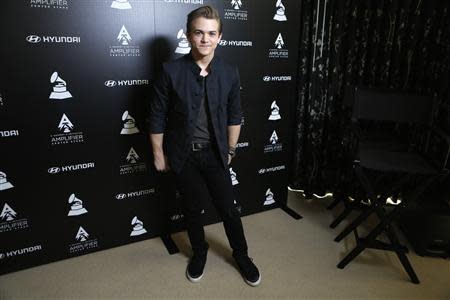 Country music singer Hunter Hayes poses during a media opportunity in Beverly Hills, California January 23, 2014. REUTERS/Mario Anzuoni