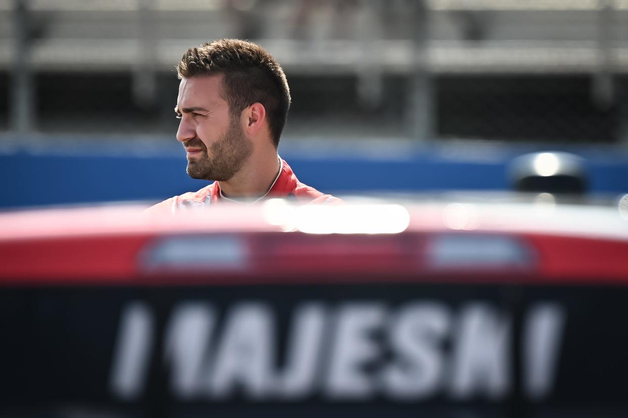 Ty Majeski waits for the start of NASCAR Craftsman Truck Series practice Saturday at the Milwaukee Mile in West Allis, Wisconsin. The race is Sunday.