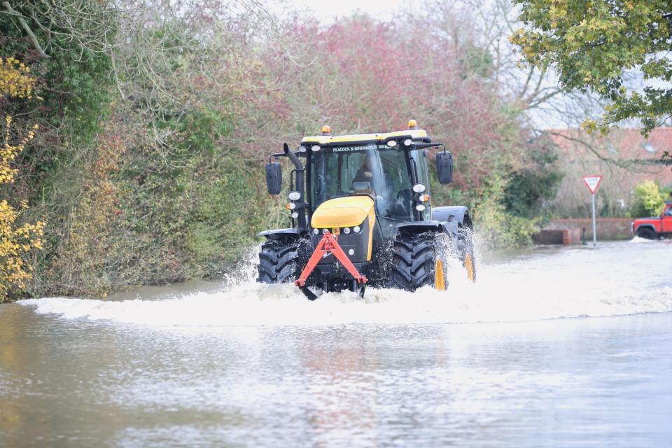 Floods hit swathes of the UK (PA)