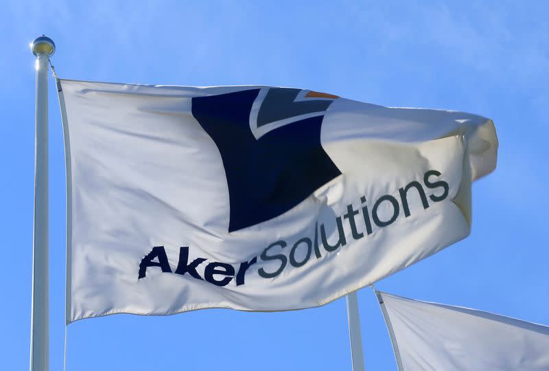 Aker Solutions flag flutters next to their headquarters in Fornebu