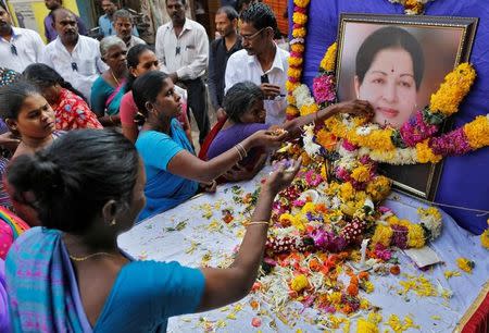 Supporters of Tamil Nadu Chief Minister Jayalalithaa Jayaraman attend a prayer ceremony at the AIADMK party office in Mumbai, India, December 6, 2016. REUTERS/Danish Siddiqui