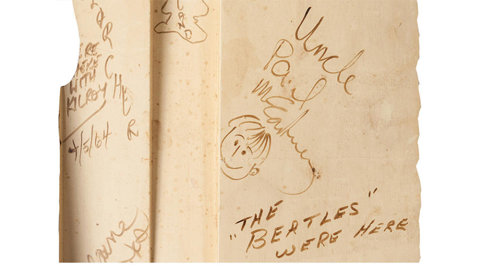 A close-up look at the wall signed by The Beatles, now taking bids 