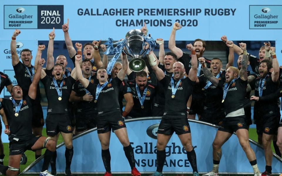 Joe Simmonds and Jack Yeandle of Exeter Chiefs lift the Gallagher Premiership trophy - GETTY IMAGES