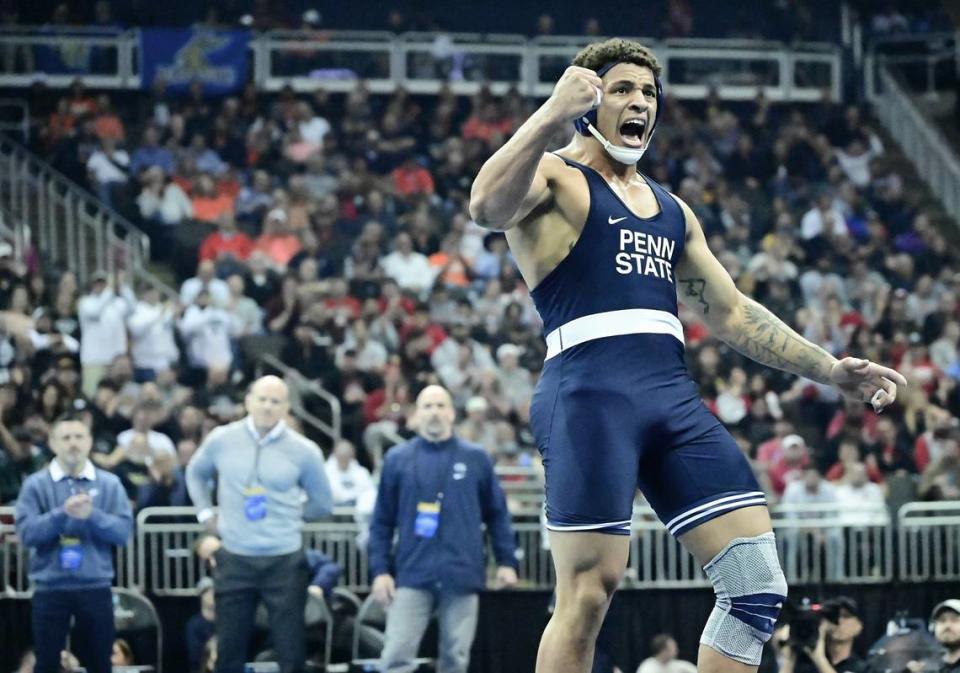 Penn State heavyweight Greg Kerkvliet celebrates Saturday night after earning his first-ever national title at the T-Mobile Center in Kansas City, Mo. Kerkvliet beat Michigan’s Lucas Davison by major decision, 13-4.