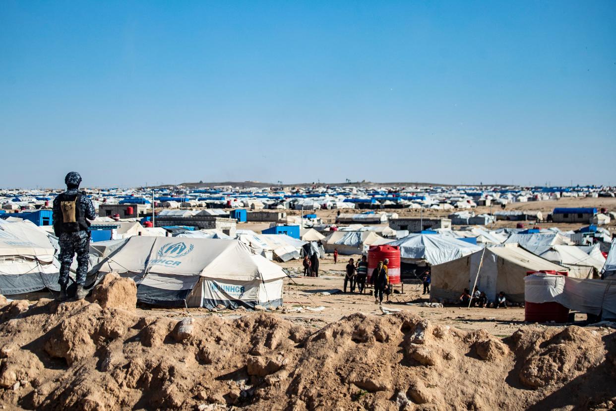 Special forces of the Syrian Democratic Forces keep watch on March 30, 2021 in the vicinity of al-Hol camp, the larger of two Kurdish-run displacement camps for relatives of Islamic State jihadists in Syria's northeast. - Kurdish forces said they had arrested 53 suspected Islamic State group members in a northeast Syria camp for relatives of jihadists, in an anti-IS security operation. (Photo by Delil SOULEIMAN / AFP) (Photo by DELIL SOULEIMAN/AFP via Getty Images)