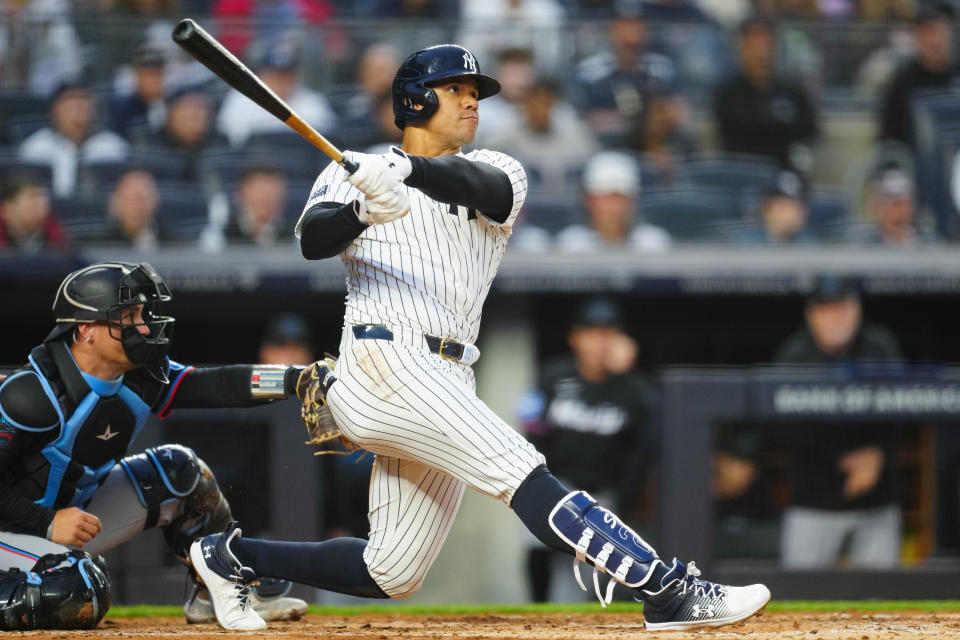 NEW YORK, NY - APRIL 08:   Juan Soto #22 of the New York Yankees hits a three-run home run in the fourth inning during the game between the Miami Marlins and the New York Yankees at Yankee Stadium on Monday, April 8, 2024 in New York, New York. (Photo by Mary DeCicco/MLB Photos via Getty Images)