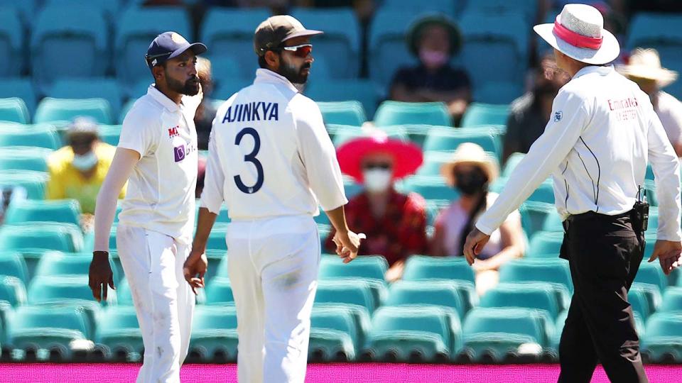 Mohammed Siraj, pictured here speaking to the umpires after an alleged abusive comment.