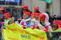 <p>Young girls dressed as Rosie the Riveter march in the Veterans Day parade on Fifth Avenue in New York on Nov. 11, 2017. (Photo: Gordon Donovan/Yahoo News) </p>