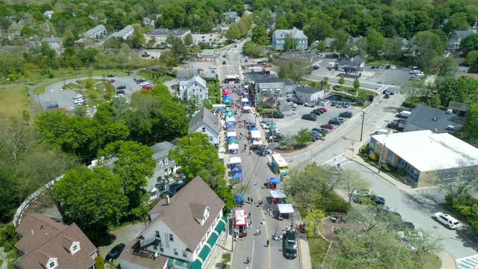 Weymouth residents gather in Jackson Square on Saturday, May 14, 2022, for the first of several village-centric events celebrating Weymouth's 400th anniversary.