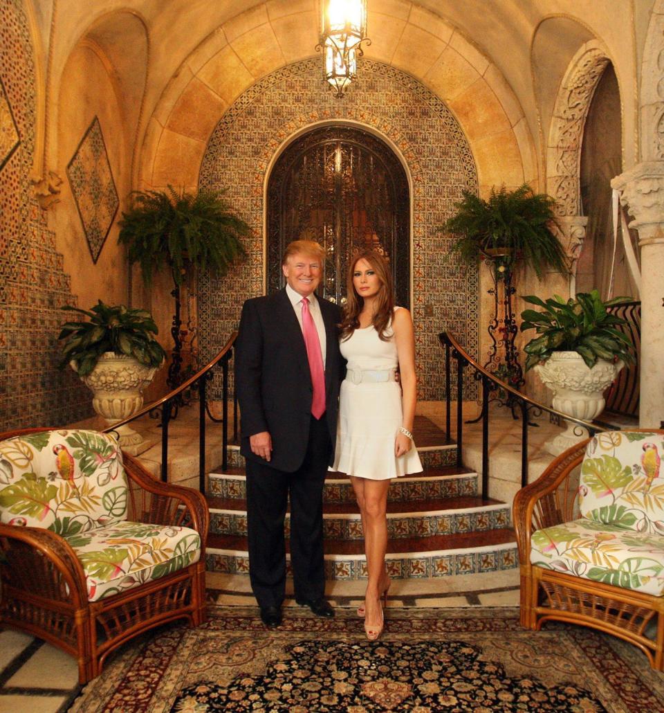 Donald and Melania Trump pose for a photo in front of their favorite spot at Mar a Lago. (2011)