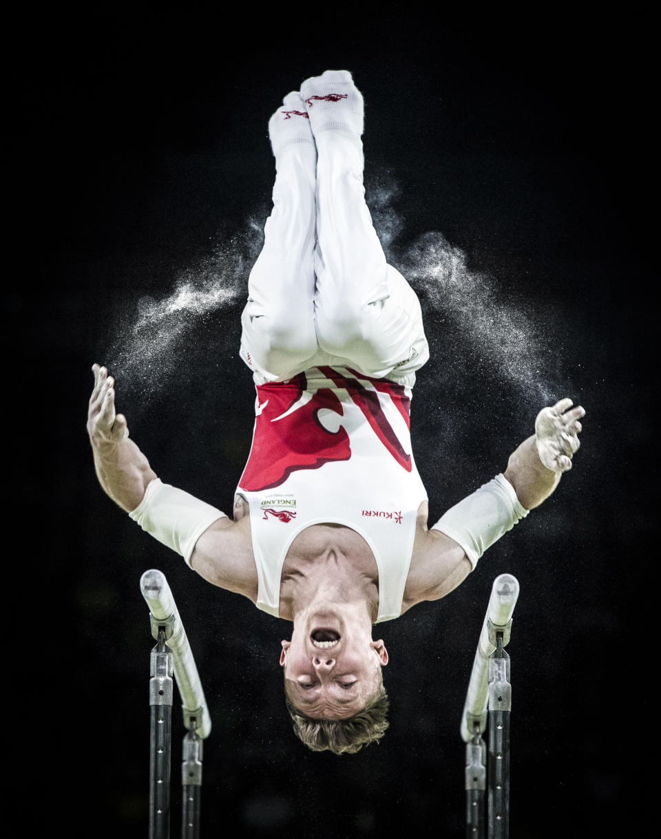 <p>England’s Nile Wilson wins Silver on the Men’s Parallel Bars at the Coomera Indoor Sports Centre during day five of the 2018 Commonwealth Games in the Gold Coast, Australia. PRESS ASSOCIATION Photo. Picture date: Monday April 9, 2018. See PA story COMMONWEALTH Gymnastics. Photo credit should read: Danny Lawson/PA Wire. RESTRICTIONS: Editorial use only. No commercial use. No video emulation. </p>