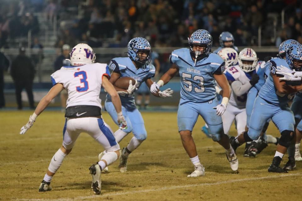 East Duplin's Nizaya Hall breaks for a gain in a fourth-round win over Whiteville.